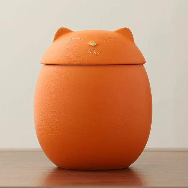 Orange cat-shaped urn